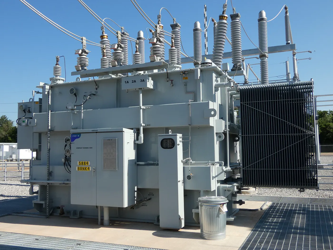 Reconditioned substation power transformer with radiator bank — representative photo